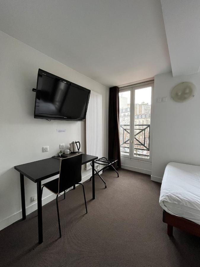 Hotel De La Tour Paris Bagian luar foto